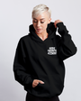 Black "GODS FAVORITE AZZHOE!" pullover hoodie on a woman, featuring a classic fit and front pouch pocket.