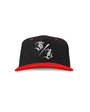 Black and red two-tone snapback hat with white "S/L" script embroidery, flat brim.