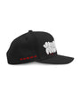 Black SMUTLIFE THROWIE 6-panel snapback hat with white graffiti text and red "THAT 100% RAW UNCUT SHIT" embroidery.