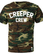 Men's short-sleeve camo t-shirt with "CREEPER CREW" in white text on the chest.