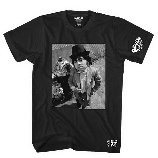 Black Smutlife men's combed cotton t-shirt with a black and white print of Hervé Villechaize, "Tattoo," by a fire hydrant.
